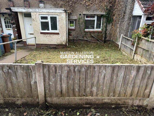 Stone overgrown garden cutback - after